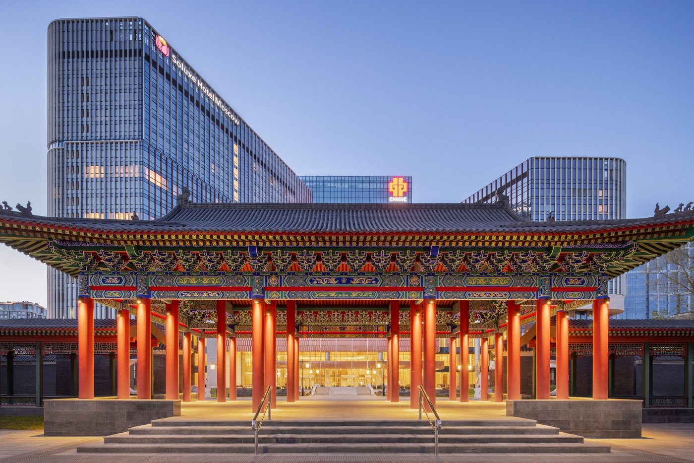 Soluxe Hotel Moscow behind a traditional Chinese pavilion